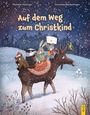 „Auf dem Weg zum Christkind“, darunter Tiere auf einem Elch im Schnee, im Hintergrund ein dunkler, verschneiter Wald.