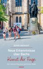 "Neue Erkenntnisse über Bachs Kunst der Fuge. Der irdische Weg einer göttlichen Seele." Eine Statue vor einer Kirche.