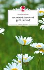 „Christine Büttner, Im Osterhasendorf geht es rund, story.one – Life is a story“. Weiße Blüten vor grünem Hintergrund.