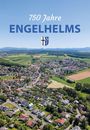 "750 Jahre ENGELHELMS" mit einem Wappen. Luftaufnahme eines ländlichen Dorfes mit Feldern und Hügeln im Hintergrund.