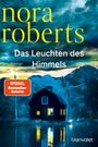 Ein Cover mit den Texten: "nora roberts", "Das Leuchten des Himmels", "Roman", "SPIEGEL Bestseller-Autorin". Ein Haus vor Bergen.