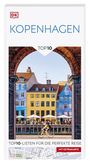 „KOPENHAGEN TOP10: Top10-Listen für die perfekte Reise.“ Bunte Häuser durch einen gemauerten Torbogen sichtbar.