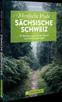 „Mystische Pfade Sächsische Schweiz“ von Christiane Hube. Ein bewaldeter Pfad, umgeben von üppigem Grün.