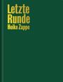 Text: "Letzte Runde Heike Zappe" in Gold auf dunkelgrünem Hintergrund.