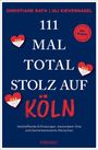 "111 MAL TOTAL STOLZ AUF KÖLN" in großen, weißen Buchstaben auf dunkelblauem Hintergrund, mit roten Herzsymbolen.