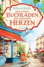 Ein hängendes Schild mit der Aufschrift: "Der kleine Buchladen der einsamen Herzen" vor einem Pariser Straßencafé.