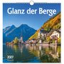 "Glanz der Berge", Kalenderdeckblatt für 2027. Malerisches Alpendorf am See mit Kirche und herbstlichen Farben.