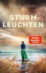 Oben: "FENJA LÜDERS". Groß: "STURM LEUCHTEN". Darunter: "ROMAN". Orange Box: "SPIEGEL Bestseller-Autorin". Unten: "Lübbe". Frau am Meer.
