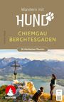 "Wandern mit Hund. Chiemgau Berchtesgaden. 36 Vierbeiner-Touren." Frau und Hund stehen auf Berggipfel, im Hintergrund Alpenpanorama, Kreuz.