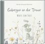 „Geborgen in der Trauer. Worte zum Trost“ von Nicola Schnack-Dörscher. Darunter zarte Blumenillustrationen.