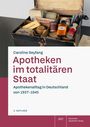 Buchtitel: "Apotheken im totalitären Staat". Ein offener Koffer mit alten Arzneimitteln und Verpackungen.
