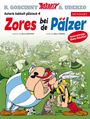 "Zores bei de Pälzer" zeigt Asterix und Obelix in einer humorvollen Szene mit vielen Römern im Hintergrund.