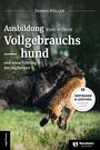 Titel: "Ausbildung zum echten Vollgebrauchshund". Ein schwarzer Hund trägt ein Tier im Maul auf einer Wiese.