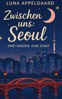 Oben steht "Luna Appelgaard". Titel: "Zwischen uns: Seoul". Untertitel: "Zwei Herzen, eine Stadt". Abendliche Stadtsilhouette.