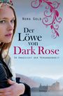 "Nora Gold: Der Löwe von Dark Rose. Im Angesicht der Vergangenheit. Roman." Links eine Frau, im Hintergrund Berge und eine Burg.