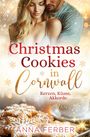 "Christmas Cookies in Cornwall. Kerzen, Küsse, Akkorde. Roman. Anna Ferber.” Ein Paar umarmt sich vor Weihnachtsplätzchen.