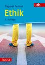 "Dagmar Fenner, Ethik, 3. Auflage, utb, basics." Jemand steht auf einer Straße mit zwei weißen Pfeilen in gelber Hose und blauen Schuhen.