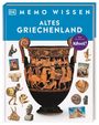 Aufschrift: "MEMO WISSEN ALTES GRIECHENLAND." Eine antike griechische Vase mit Verzierungen und umliegende Artefakte und Statuen.