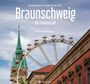 "Braunschweig - Die Löwenstadt" mit einem Kirchenkirchturm, einem Riesenrad und einem historischen Gebäude im Vordergrund.