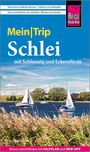 Titel: "Mein Trip Schlei mit Schleswig und Eckernförde". Oben zwei Segelboote auf einem Fluss, grüne Landschaft.