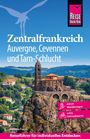 Text: "Zentralfrankreich - Auvergne, Cevennen und Tarn-Schlucht. Bettina Forst. Reiseführer für individuelles Entdecken."  
Darunter ein altes Gebäude auf einem Felsen.