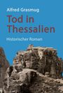 Text: "Alfred Grasmug, Tod in Thessalien, Historischer Roman, Karolinger". Alte Gebäude auf Felsen im Hintergrund.
