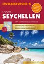 Titel: Iwanowski's Seychellen. Ein paradiesischer Strand mit Palmen und türkisblauem Meer.
