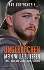 "UNBROKEN: Mein Wille zu Leben", 738 Tage als Geisel der Hamas. Porträt eines Mannes mit Bart und Kappe.