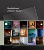 "Nicole Ahland Atlas der Räume" steht auf dunklem Hintergrund. Darunter sind kleine Fotos von Innenräumen in neutralen Farben.