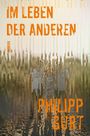 "Im Leben der Anderen" und "Philipp Gurt" in Orange. Verpixeltes Gruppenfoto in einer sandigen Umgebung.