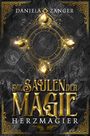 "DIE SÄULEN DER MAGIE: HERZMAGIER" in großen, goldenen Buchstaben. Goldene Ornamente und leuchtende Edelsteine verzieren die Gestaltung.
