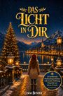 Text: "Das Licht in Dir. 24 berührende Weihnachtsgeschichten voller Liebe, Hoffnung, Mitgefühl und kleiner Wunder."

Szene: Eine Person sieht einen winterlichen, beleuchteten See und ein Dorf.