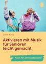 Sirin Kilic: Aktivieren mit Musik für Senioren leicht gemacht. Auch für „Unmusikalische“. Zwei Senioren tanzen fröhlich.