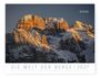 „DIE WELT DER BERGE 2027“ und „DAV“. Schneebedeckte, goldene Bergspitzen bei Sonnenuntergang.