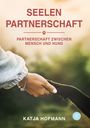 "SEELEN PARTNERSCHAFT" und "PARTNERSCHAFT ZWISCHEN MENSCH UND HUND". Eine Hand hält eine Hundepfote.