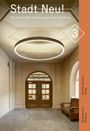 „Stadt Neu! Beispielhafte Sanierungen aus Hamburg“ steht oben. Im Bild: Ein Eingangsbereich mit runden Leuchtring.