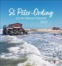 "St. Peter-Ording und die Halbinsel Eiderstedt 2027." Eine Holzstruktur steht in der Brandung am Strand unter blauem Himmel.