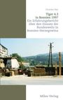 Titel: "Tiger 4.3 in Bosnien 1997". Eine Militärbasis mit Stacheldraht und Fahrzeug vor einer bewaldeten Hügellandschaft.