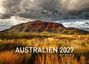 AUSTRALIEN 2027, Limited Edition. Ein dramatischer Himmel über einer bergigen Landschaft mit rotem Gestein und Gras.