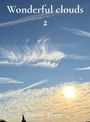 "Wonderful clouds 2" und "Jimmy Jones". Himmel mit feinen, auffälligen Wolken und einer hellen Sonne.