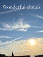 Text: "Wonderful clouds 2", "Jimmy Jones". Himmel mit Wolken und Sonnenuntergang, Kirchturm im Vordergrund.