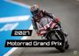 2027 Motorrad Grand Prix. Ein Motorradfahrer in Aktion auf einer Rennstrecke, dynamisch, mit Sponsorlogos auf Anzug und Motorrad.