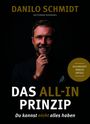 "DANILO SCHMIDT", "DAS ALL-IN PRINZIP", "Du kannst nicht alles haben". Porträt eines lächelnden Mannes mit Bart.