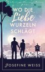 Text: "Wo die Liebe Wurzeln schlägt", "Roman", "Josefine Weiss", "Feuer Werke Verlag". Silhouettenpaar vor Gartenzaun.