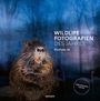 Text: "Wildlife Fotografien des Jahres, Portfolio 36, Vorläufiges Cover." Ein Nutria vor einem nebligen, bewaldeten Hintergrund.