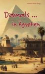 "Damals ... in Ägypten" steht in roter Schrift. Darunter eine antike ägyptische Szene mit Pyramiden, Palmen und Menschen.