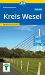 Radwanderkarte Kreis Wesel, wetterfest, GPS-Tracks, E-Bike-geeignet. Foto: Wiese, Bäume, Brücke, leuchtender Himmel.