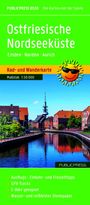 Text "Ostfriesische Nordseeküste", "Rad- und Wanderkarte", "Maßstab 1:50 000". Illustration von Wasserweg und Häusern.