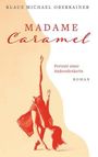 Text: "Klaus Michael Oberrainer", "Madame Caramel", "Portrait einer Andersdenkerin", "Roman". Frau im roten Kleid, Handstand.