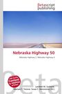 "Nebraska Highway 50", "Nebraska Highway 2, Nebraska Highway 4". Eine gerade Straße durch eine weite, flache Landschaft.